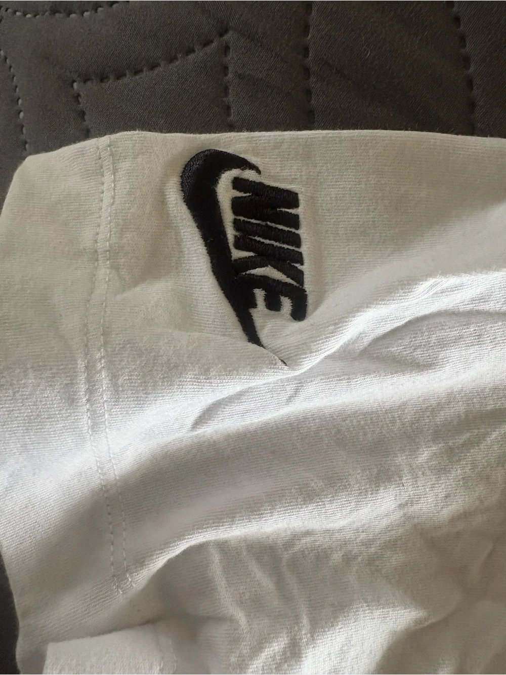 Nike White Crop Top with Multicolor Flag Graphics